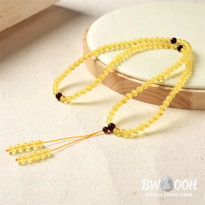 BWOOOH 108 Mala meditation bracelet featuring 5mm natural cherry amber beads, designed to clear anxiety, promote focus, and bring spiritual balance. - View 5