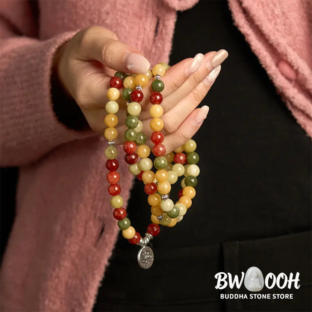 BWOOOH 108 Mala Beads bracelet, handcrafted with polished 8mm Topaz, Red Jasper, and Green Jasper stones on elastic string, featuring an engraved lotus pendant, shown on a neutral background, symbolizing protection and spiritual growth for mindfulness practices. - View 4