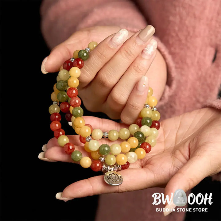 BWOOOH 108 Mala Beads bracelet, handcrafted with polished 8mm Topaz, Red Jasper, and Green Jasper stones on elastic string, featuring an engraved lotus pendant, shown on a neutral background, symbolizing protection and spiritual growth for mindfulness practices. - View 5