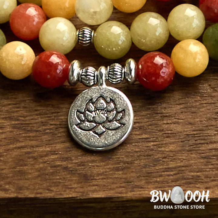 BWOOOH 108 Mala Beads bracelet, handcrafted with polished 8mm Topaz, Red Jasper, and Green Jasper stones on elastic string, featuring an engraved lotus pendant, shown on a neutral background, symbolizing protection and spiritual growth for mindfulness practices. - View 7