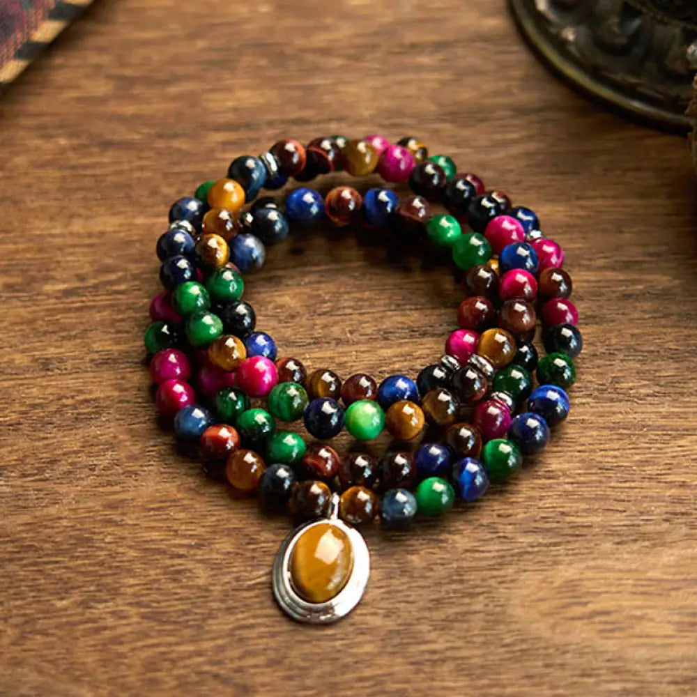 BWOOOH 108 Colorful Tiger Eye Mala Bracelet, showcasing vibrant natural red, blue, green, and golden tiger eye beads. A multi-turn spiritual protection accessory designed for mindfulness, emotional balance, and confidence.