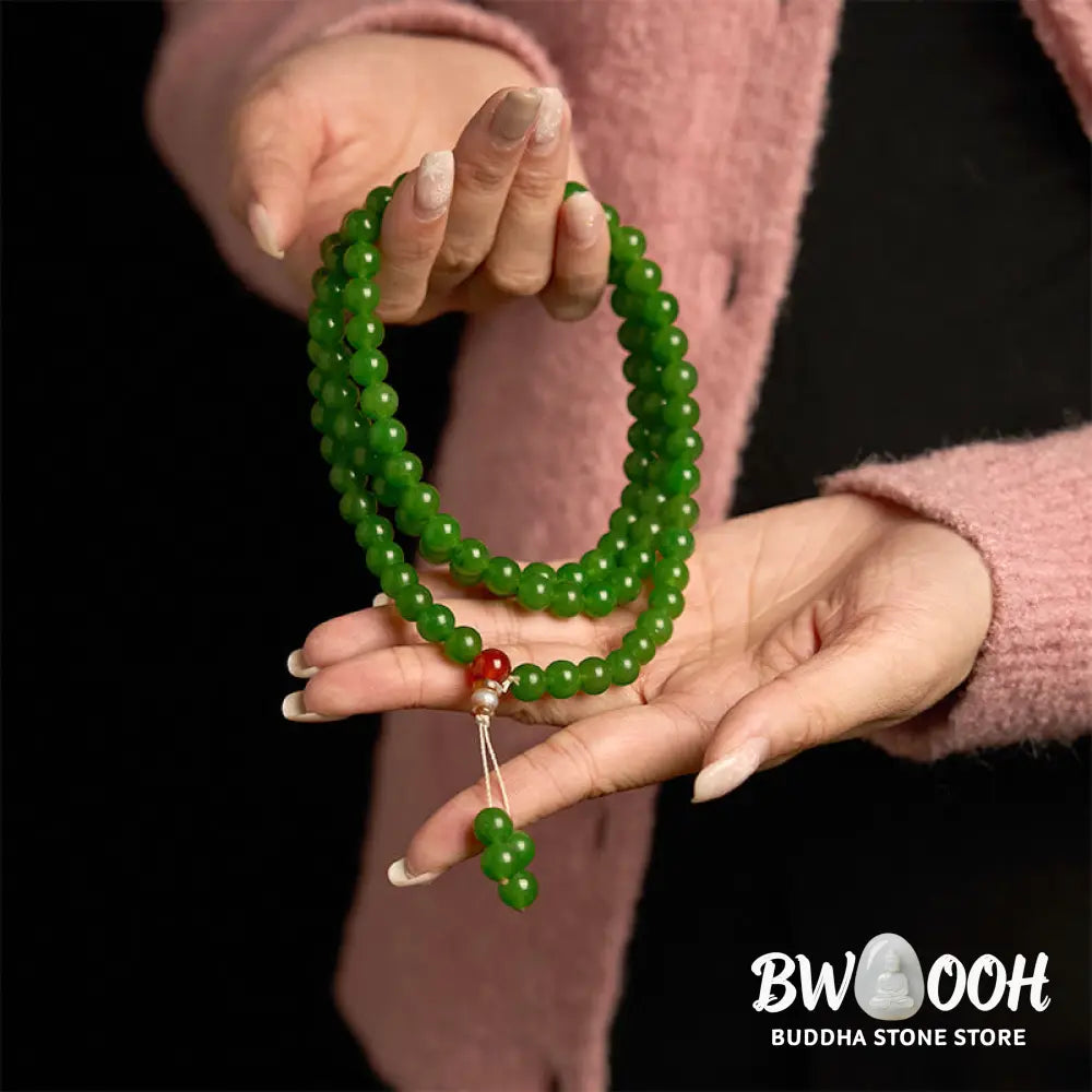 A BWOOOH 108-bead natural Cyan Jade mala bracelet, featuring smooth 8mm blue-green beads strung on premium elastic, ideal for meditation and daily wear. - View 5