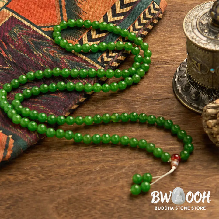 A BWOOOH 108-bead natural Cyan Jade mala bracelet, featuring smooth 8mm blue-green beads strung on premium elastic, ideal for meditation and daily wear. - View 3