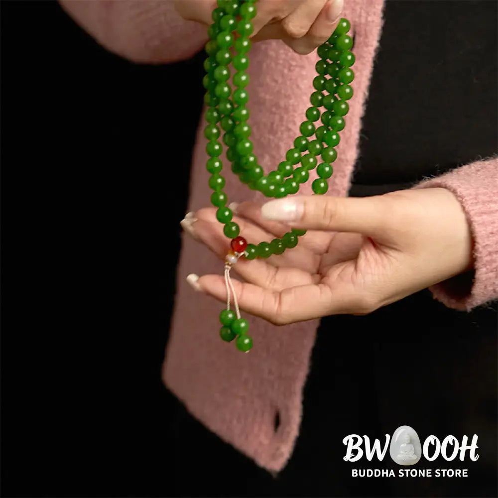 A BWOOOH 108-bead natural Cyan Jade mala bracelet, featuring smooth 8mm blue-green beads strung on premium elastic, ideal for meditation and daily wear. - View 6