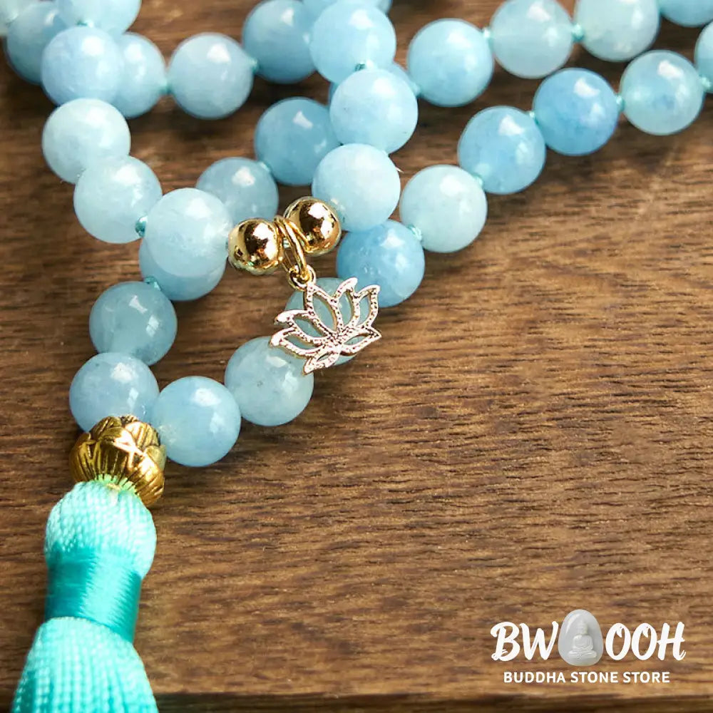 BWOOOH 108 Aquamarine Mala meditation bracelet featuring 8mm natural aquamarine beads and a delicate hollow lotus pendant, designed for spiritual healing and inner peace. Unisex, elastic string fit. - View 10