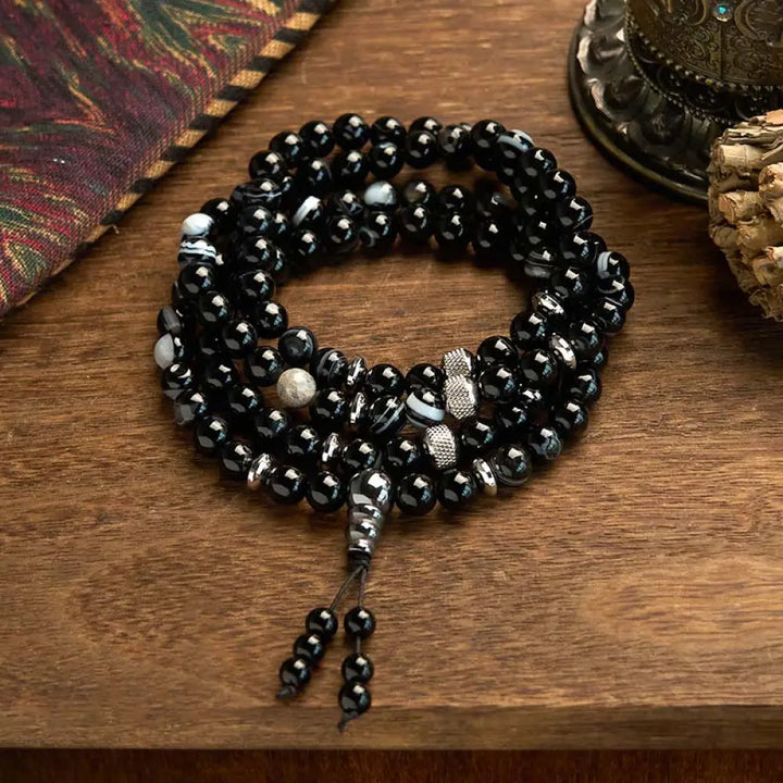BWOOOH 108 Mala Beads Black Onyx protection bracelet with 8mm natural stones and premium elastic string, designed for deep meditation and grounding spiritual practice.