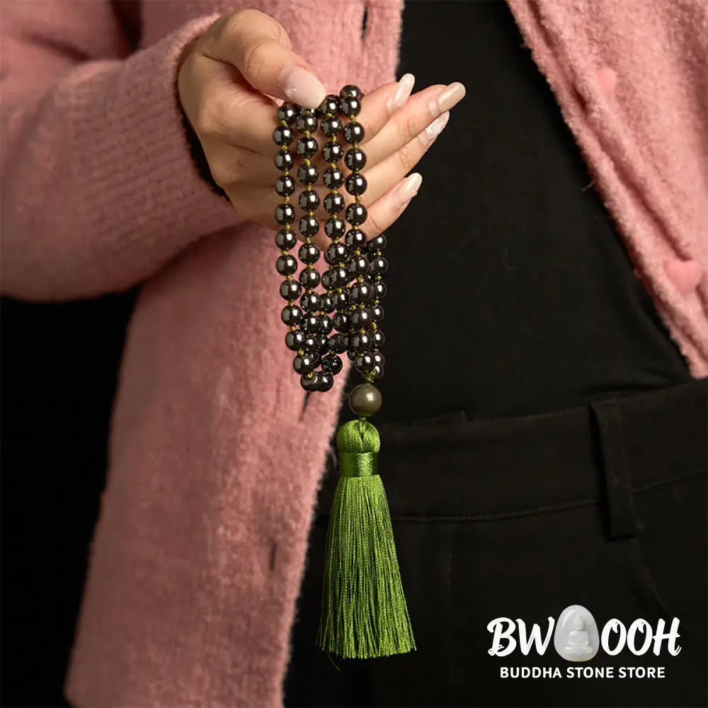 BWOOOH 108 Mala Beads natural hematite powerful bracelet with vibrant green tassel, symbolizing grounding and renewal for meditation and focus. - View 3