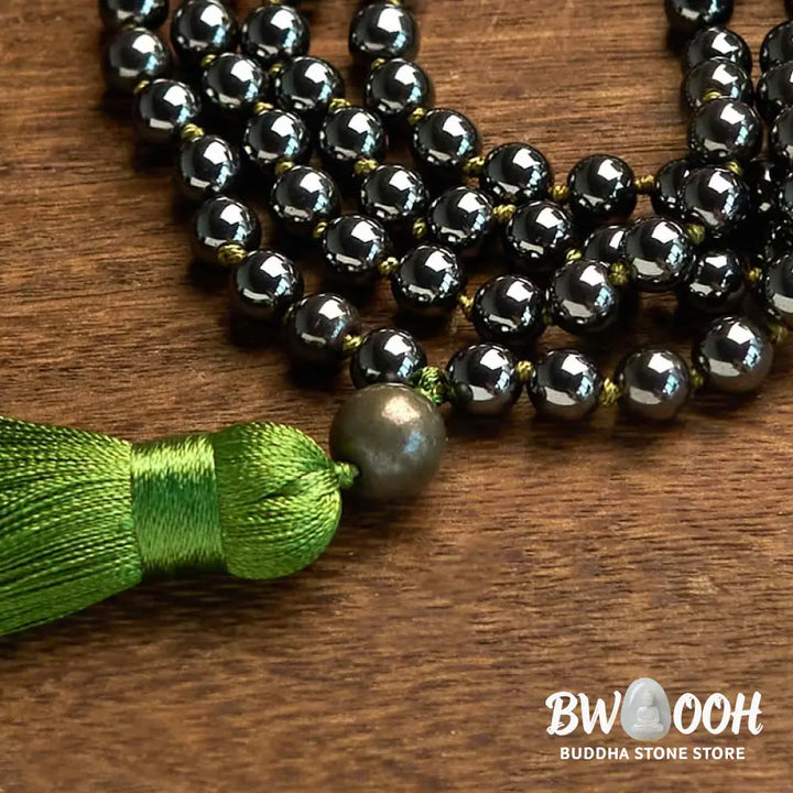 BWOOOH 108 Mala Beads natural hematite powerful bracelet with vibrant green tassel, symbolizing grounding and renewal for meditation and focus. - View 6