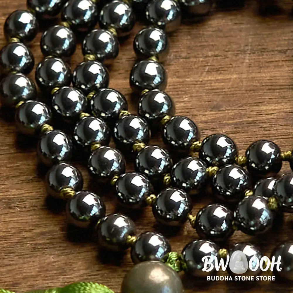 BWOOOH 108 Mala Beads natural hematite powerful bracelet with vibrant green tassel, symbolizing grounding and renewal for meditation and focus. - View 5