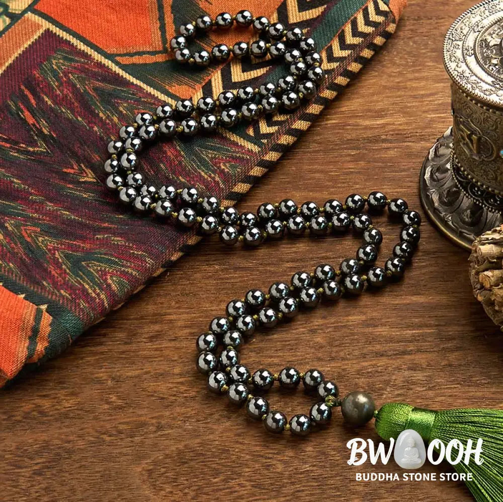 BWOOOH 108 Mala Beads natural hematite powerful bracelet with vibrant green tassel, symbolizing grounding and renewal for meditation and focus. - View 2