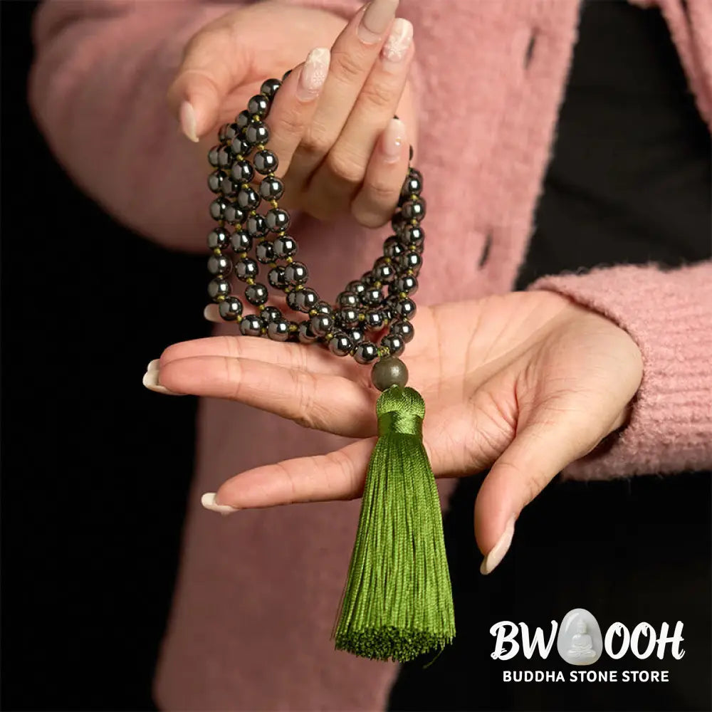 BWOOOH 108 Mala Beads natural hematite powerful bracelet with vibrant green tassel, symbolizing grounding and renewal for meditation and focus. - View 4