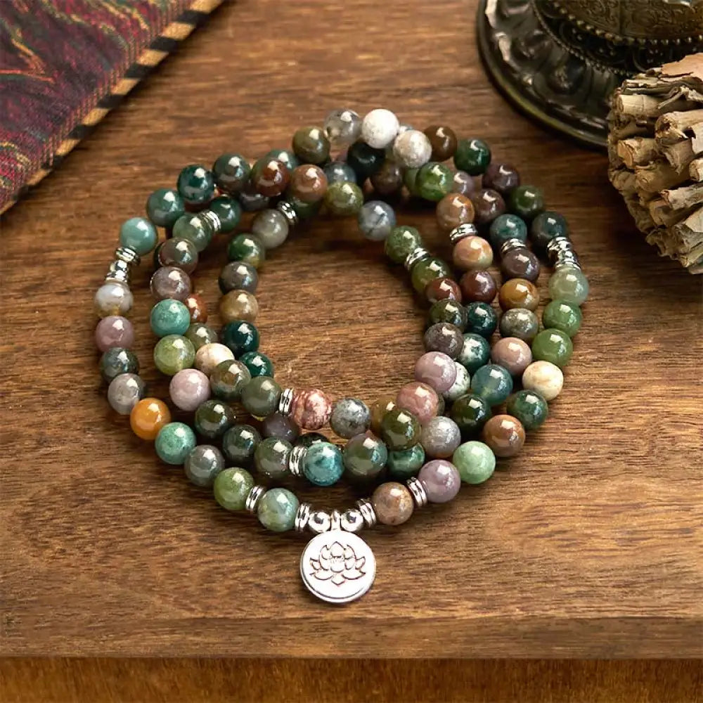 BWOOOH 108-bead Indian Agate Mala Bracelet featuring 8mm natural stone beads and a round engraved lotus pendant, strung on premium elastic, for mindfulness and calm.