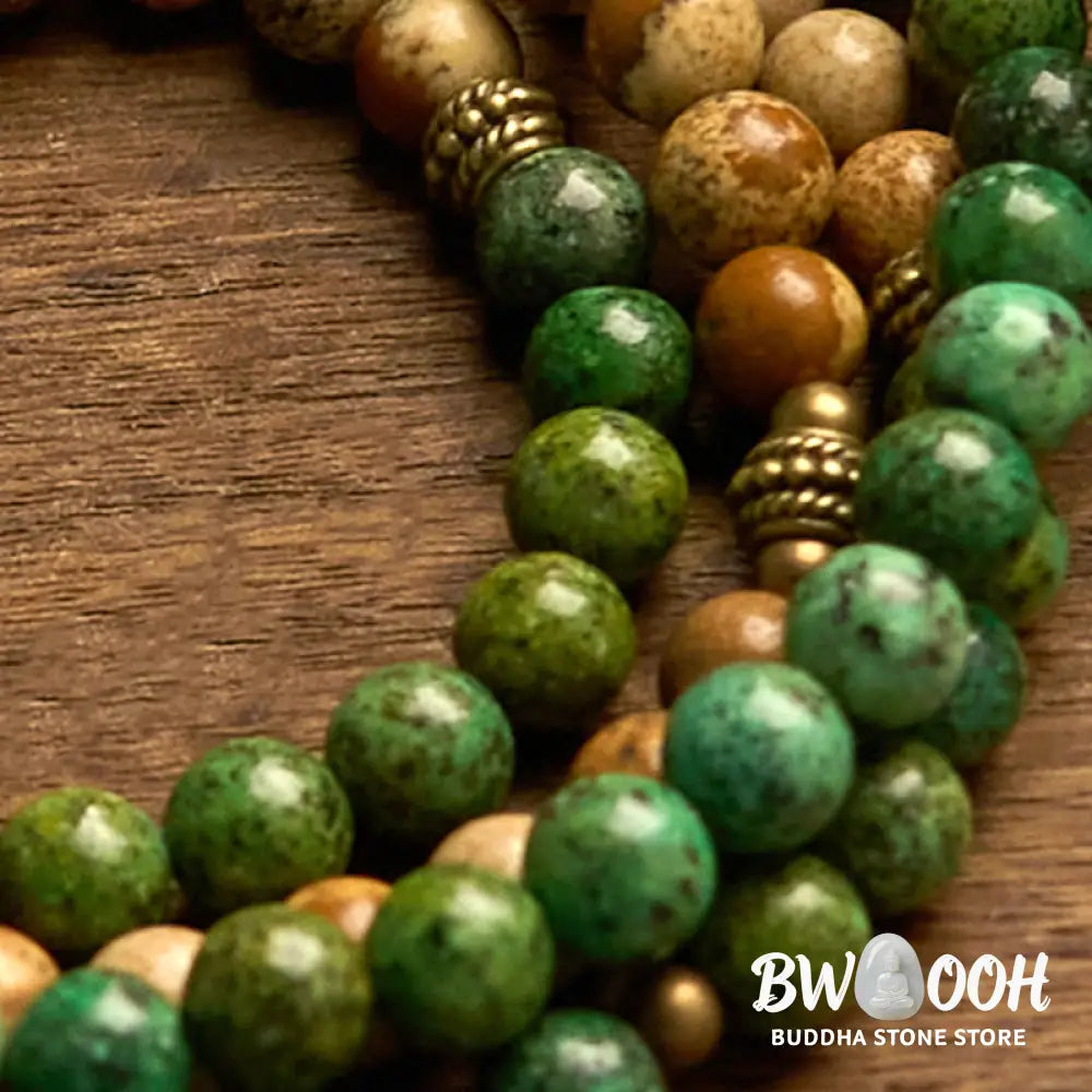 BWOOOH 108 Mala bracelet featuring earth-toned Picture Jasper and vibrant Turquoise 8mm beads, meticulously strung on premium elastic, with a prominent round silver lotus pendant symbolizing purity and growth. Ideal for mindful reflection. - View 7