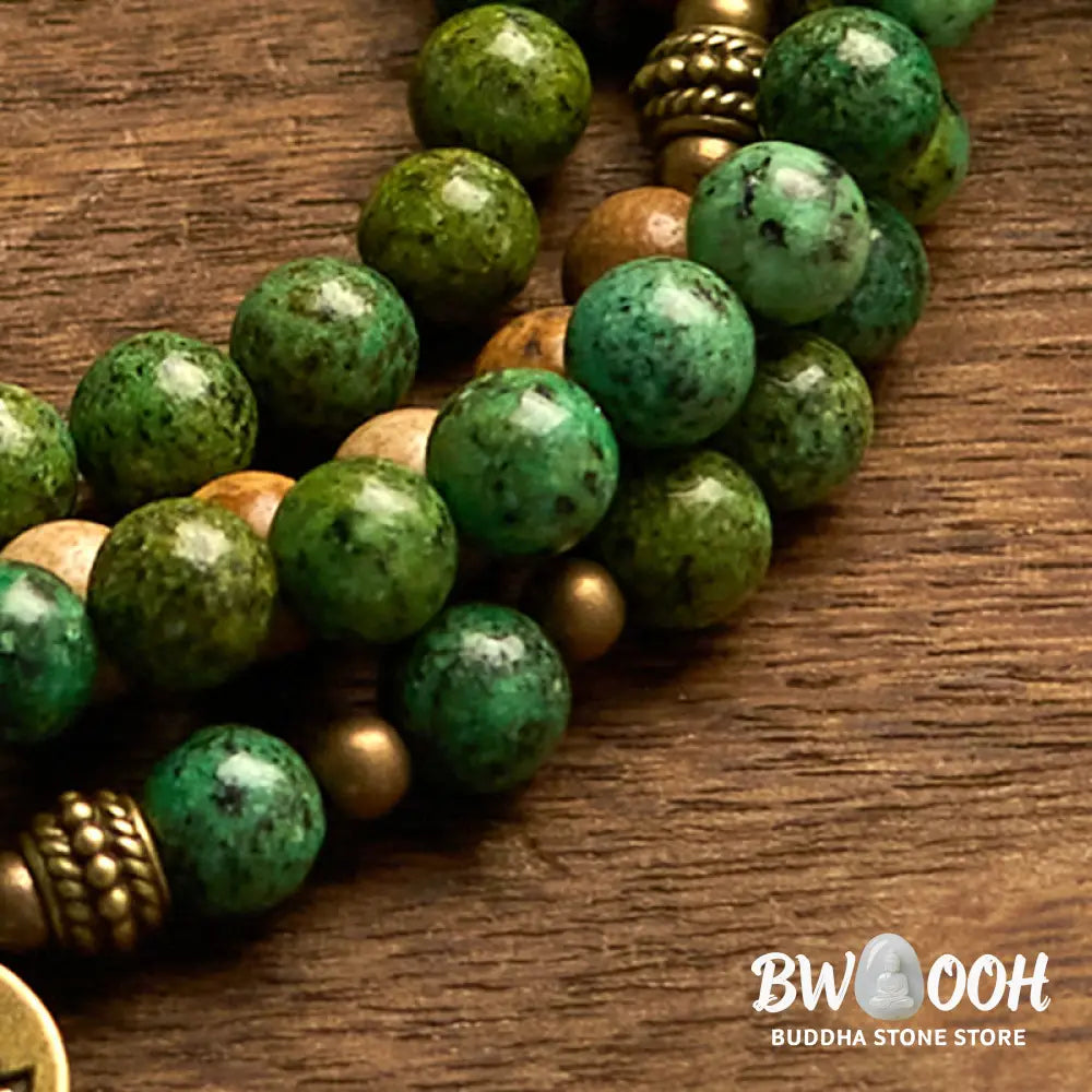 BWOOOH 108 Mala bracelet featuring earth-toned Picture Jasper and vibrant Turquoise 8mm beads, meticulously strung on premium elastic, with a prominent round silver lotus pendant symbolizing purity and growth. Ideal for mindful reflection. - View 6