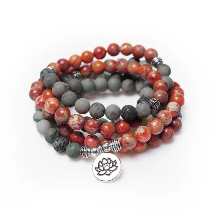 BWOOOH 108-bead Sea Sediment Jasper Lotus Protection Bracelet, displaying natural blue-green and orange Jasper beads with a silver-tone lotus charm, laid against a neutral background.