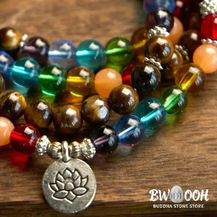 BWOOOH 108 Mala Beads bracelet featuring 8mm natural Tiger Eye and colorful glass beads on an elastic string, adorned with an engraved lotus pendant, symbolizing purity and protection. Unisex design for spiritual practice. - View 6