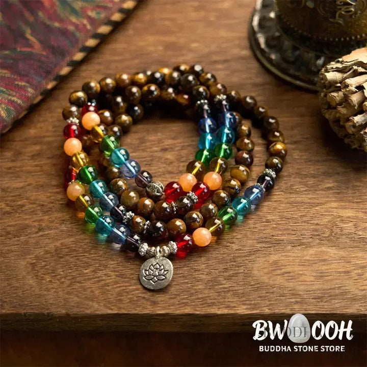 BWOOOH 108 Mala Beads bracelet featuring 8mm natural Tiger Eye and colorful glass beads on an elastic string, adorned with an engraved lotus pendant, symbolizing purity and protection. Unisex design for spiritual practice. - View 5