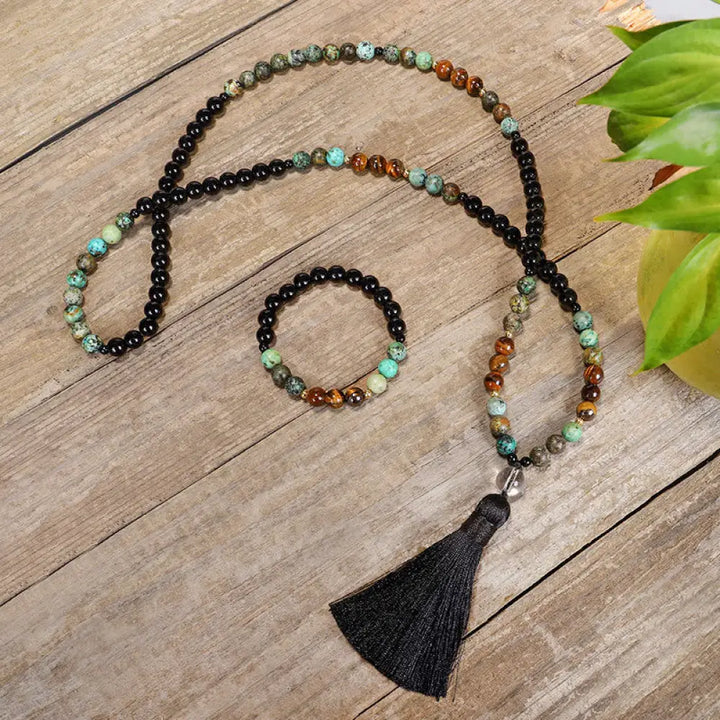 BWOOOH 108 Mala Beads handcrafted from natural Tiger Eye and Turquoise stones, strung on premium elastic string, worn as a protection and strength bracelet and necklace, featuring an 8.5cm tassel.