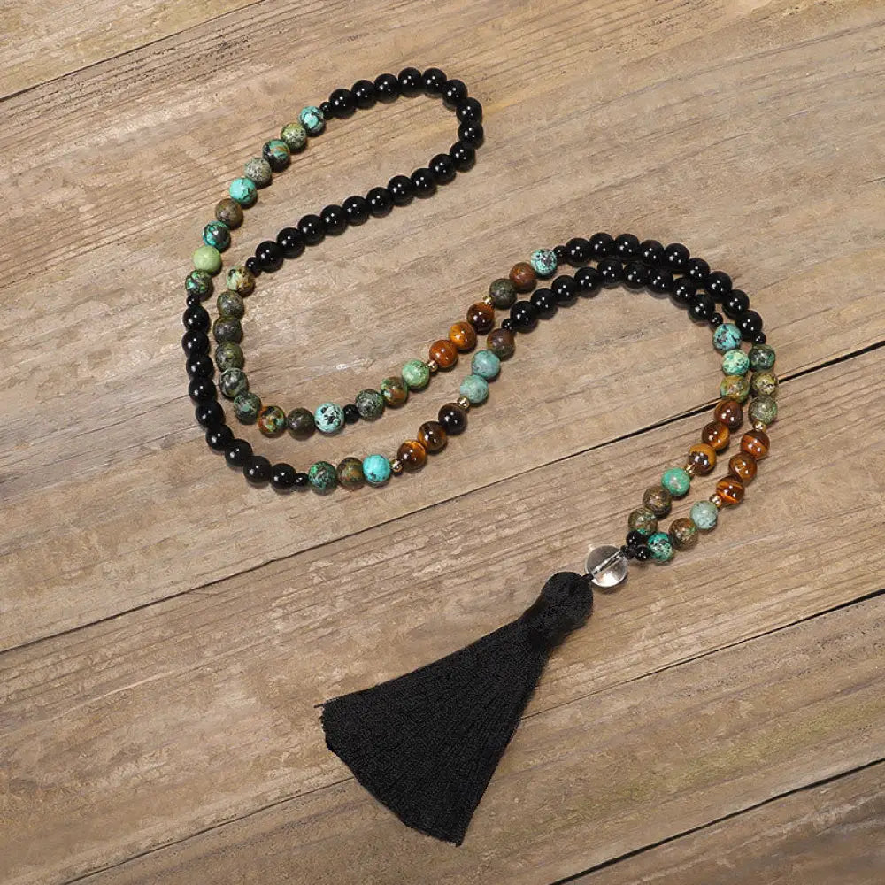 BWOOOH 108 Mala Beads handcrafted from natural Tiger Eye and Turquoise stones, strung on premium elastic string, worn as a protection and strength bracelet and necklace, featuring an 8.5cm tassel. - View 5