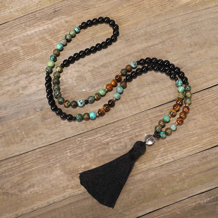 BWOOOH 108 Mala Beads handcrafted from natural Tiger Eye and Turquoise stones, strung on premium elastic string, worn as a protection and strength bracelet and necklace, featuring an 8.5cm tassel. - View 5