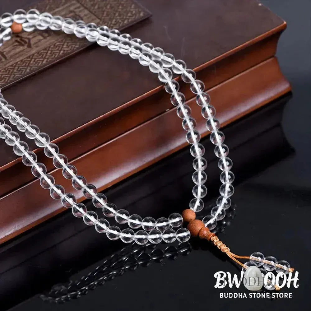 BWOOOH 108 Mala Beads, a unisex meditation bracelet featuring 6mm natural white crystal and distinct sandalwood beads, elegantly wrapped on a premium elastic string. - View 4