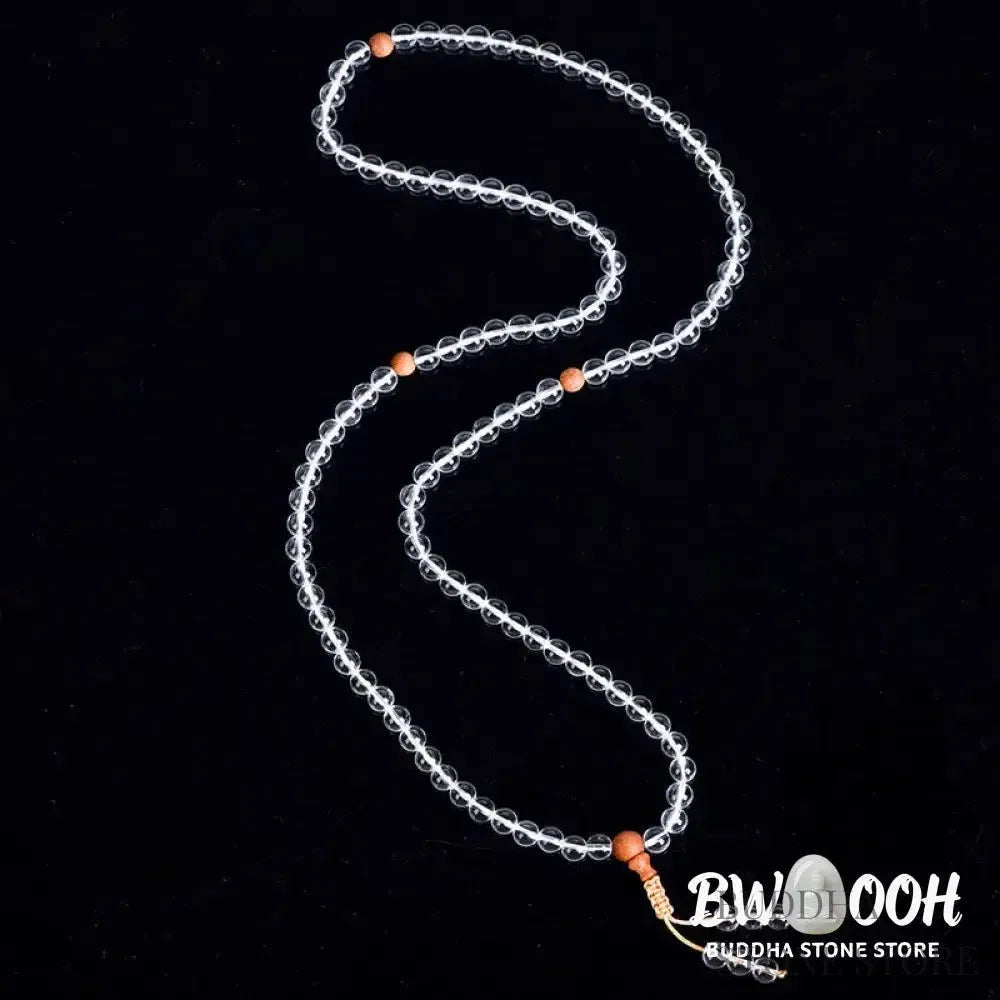 BWOOOH 108 Mala Beads, a unisex meditation bracelet featuring 6mm natural white crystal and distinct sandalwood beads, elegantly wrapped on a premium elastic string. - View 5