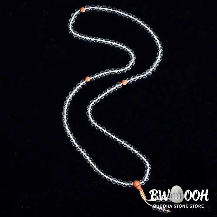 BWOOOH 108 Mala Beads, a unisex meditation bracelet featuring 6mm natural white crystal and distinct sandalwood beads, elegantly wrapped on a premium elastic string. - View 5