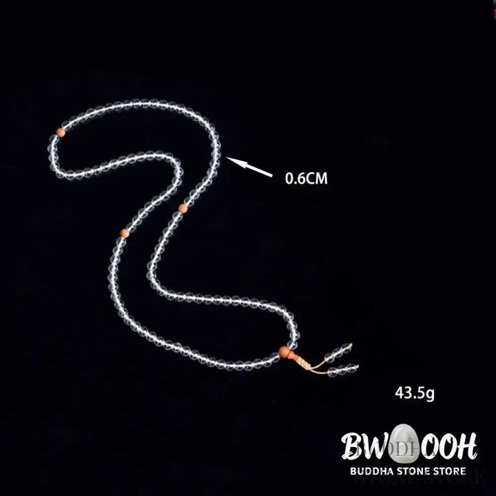 BWOOOH 108 Mala Beads, a unisex meditation bracelet featuring 6mm natural white crystal and distinct sandalwood beads, elegantly wrapped on a premium elastic string. - View 6