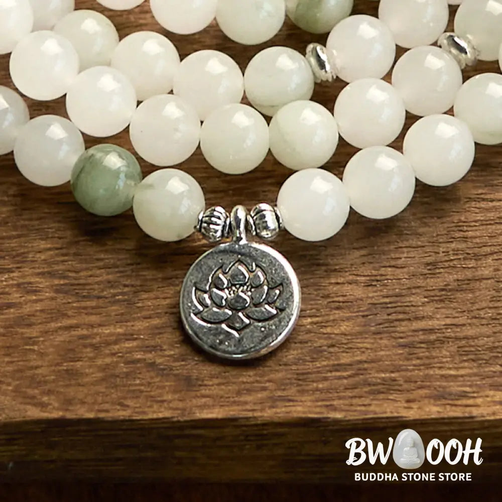 BWOOOH 108-bead Tianshan Jade Mala bracelet, handcrafted with 8mm calming green jade beads and an engraved silver-tone lotus charm on a premium elastic string, photographed against a minimalist backdrop, highlighting its spiritual elegance and detailed craftsmanship for meditation and mindful wear. - View 8