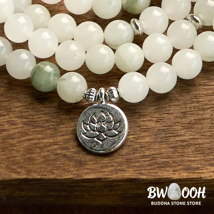 BWOOOH 108-bead Tianshan Jade Mala bracelet, handcrafted with 8mm calming green jade beads and an engraved silver-tone lotus charm on a premium elastic string, photographed against a minimalist backdrop, highlighting its spiritual elegance and detailed craftsmanship for meditation and mindful wear. - View 8