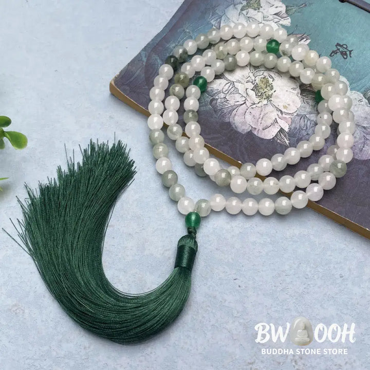 BWOOOH 108 Mala Beads Bracelet featuring polished natural Tianshan Jade, accented with a vibrant tassel. This exquisite meditation and luck accessory showcases the unique jade stone, interwoven with South Red Agate and Green Agate, designed for spiritual balance and attracting prosperity. - View 2