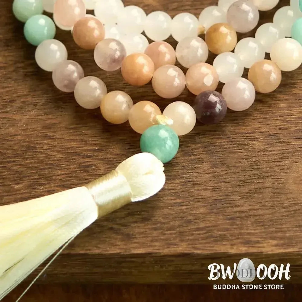 BWOOOH 108-bead Mala bracelet featuring 8mm natural white jade and amazonite beads with a delicate white tassel on premium elastic string, promoting healing and balance. - View 10