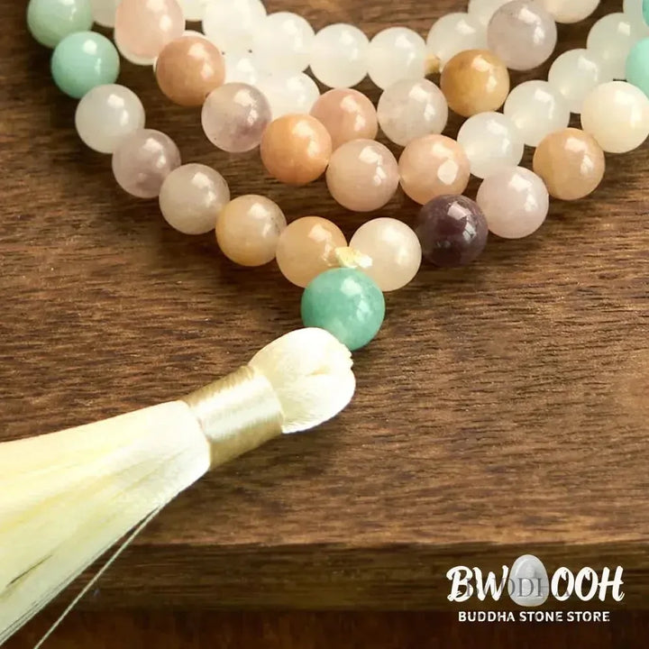 BWOOOH 108-bead Mala bracelet featuring 8mm natural white jade and amazonite beads with a delicate white tassel on premium elastic string, promoting healing and balance. - View 10