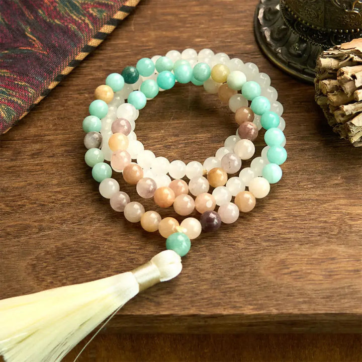 BWOOOH 108-bead Mala bracelet featuring 8mm natural white jade and amazonite beads with a delicate white tassel on premium elastic string, promoting healing and balance.