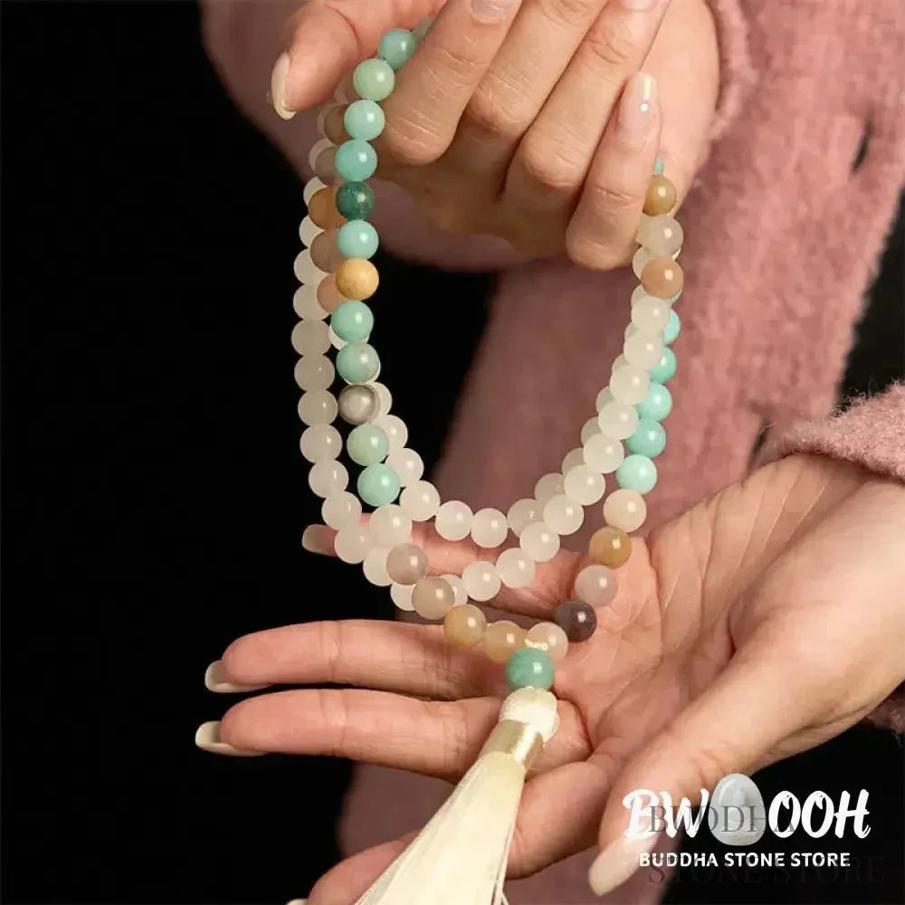 BWOOOH 108-bead Mala bracelet featuring 8mm natural white jade and amazonite beads with a delicate white tassel on premium elastic string, promoting healing and balance. - View 4