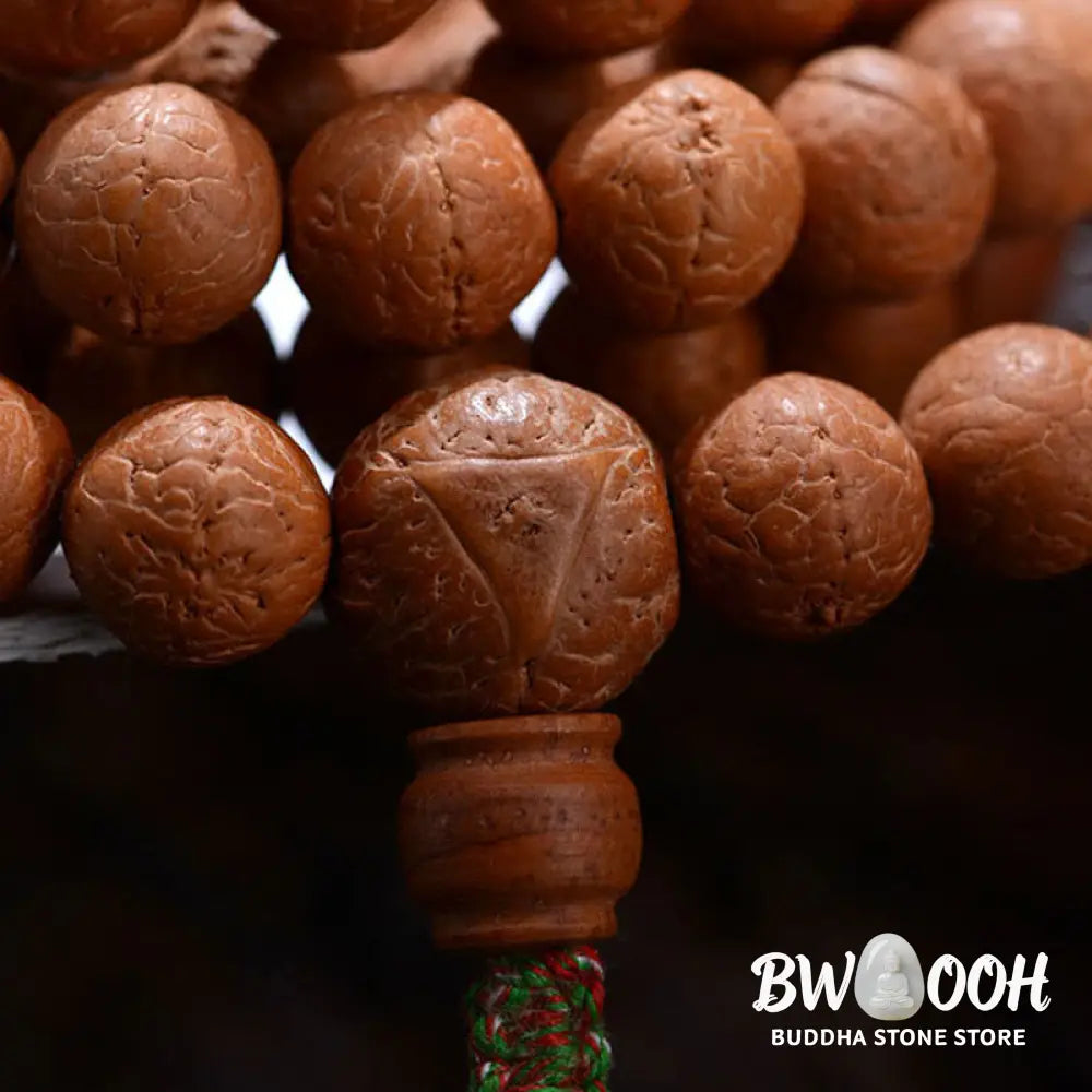 BWOOOH 108-bead Nepal Bodhi Seed Mala bracelet featuring varied 11-13mm dark-speckled seeds on premium string, with a symbolic tassel, designed for meditation and daily spiritual awareness. - View 7