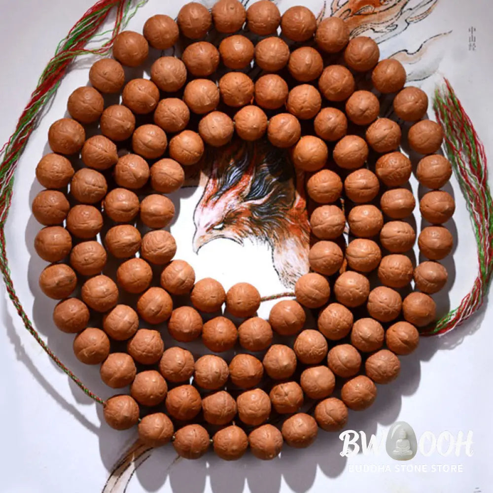 A BWOOOH 108-bead Nepal Bodhi Seed Mala bracelet, handcrafted with unique dark-speckled seeds on premium string, for meditation, enlightenment, and positive energy. - View 3