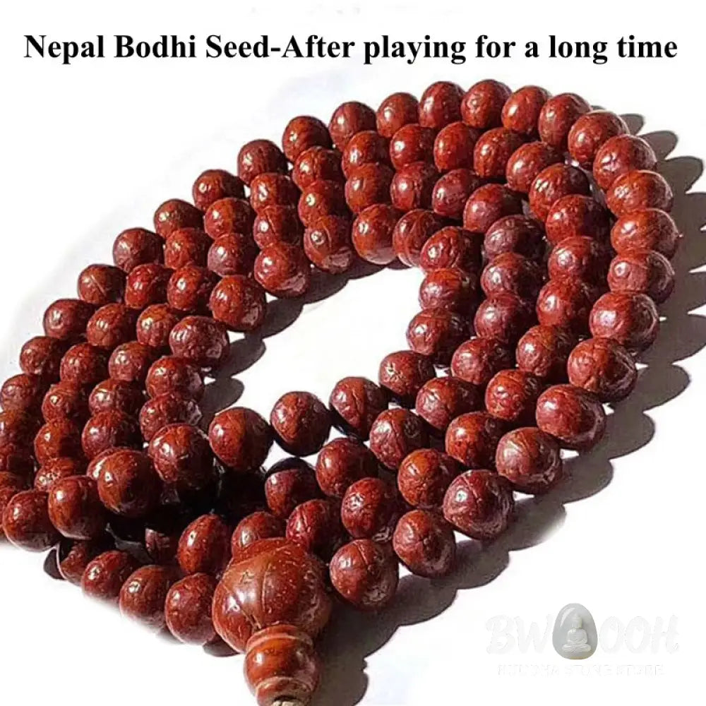 A BWOOOH 108-bead Nepal Bodhi Seed Mala bracelet, handcrafted with unique dark-speckled seeds on premium string, for meditation, enlightenment, and positive energy. - View 15