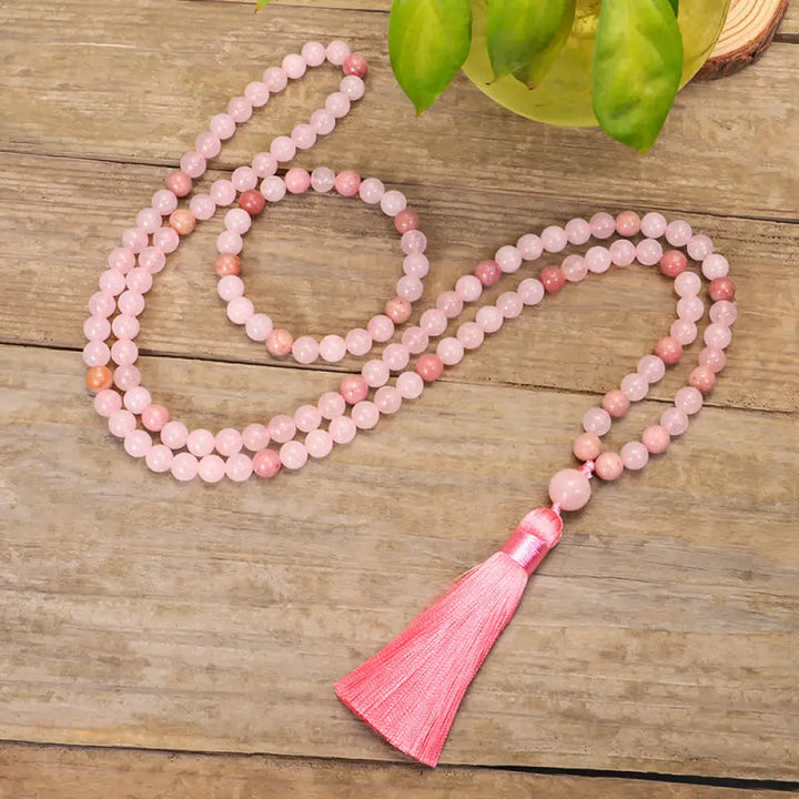 BWOOOH 108 Mala Beads Pink Crystal Love Tassel Bracelet, handcrafted with 8mm pink crystal beads on premium elastic string, featuring a matching love-inspired tassel, ideal for meditation, spiritual balance, and promoting self-acceptance.