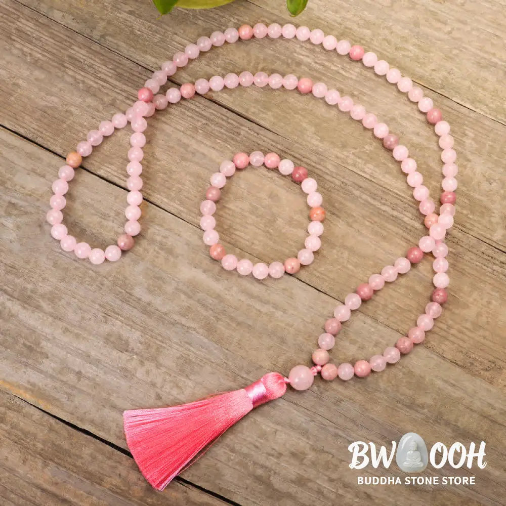 BWOOOH 108 Mala Beads Pink Crystal Love Tassel Bracelet, handcrafted with 8mm pink crystal beads on premium elastic string, featuring a matching love-inspired tassel, ideal for meditation, spiritual balance, and promoting self-acceptance. - View 2