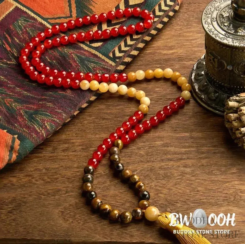 BWOOOH 108-bead Red Agate & Tiger Eye mala bracelet with vibrant yellow tassel, handcrafted for Zen meditation, promoting emotional balance, inner strength, and focused tranquility. - View 2