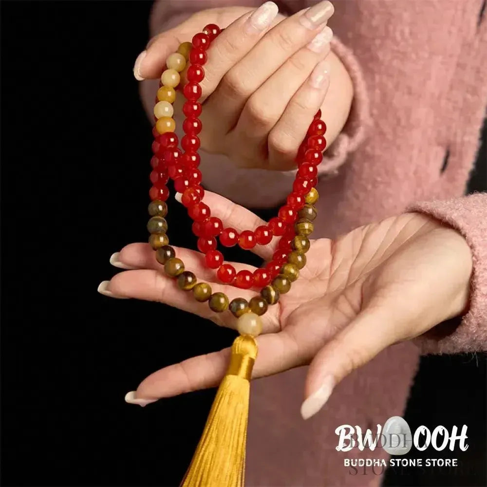 BWOOOH 108-bead Red Agate &amp; Tiger Eye mala bracelet with vibrant yellow tassel, handcrafted for Zen meditation, promoting emotional balance, inner strength, and focused tranquility. - View 4