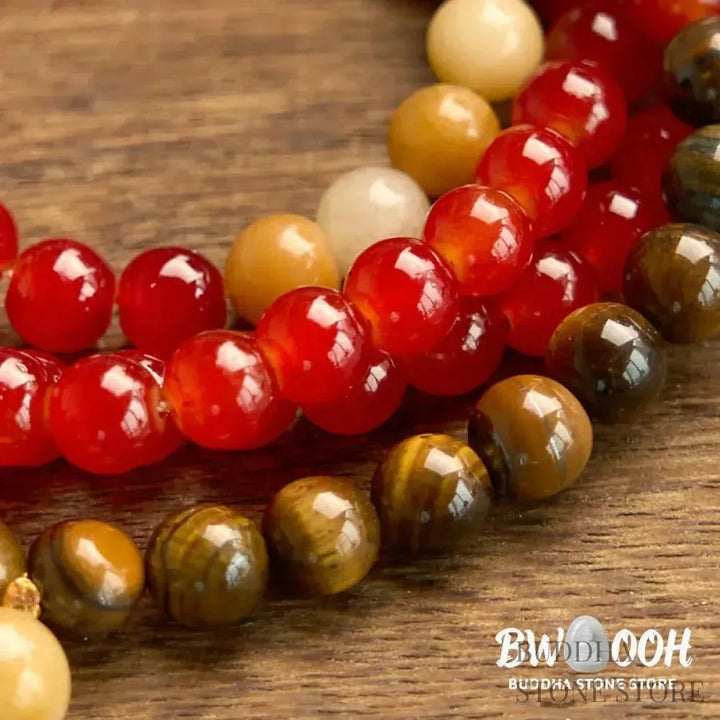 BWOOOH 108-bead Red Agate &amp; Tiger Eye mala bracelet with vibrant yellow tassel, handcrafted for Zen meditation, promoting emotional balance, inner strength, and focused tranquility. - View 6