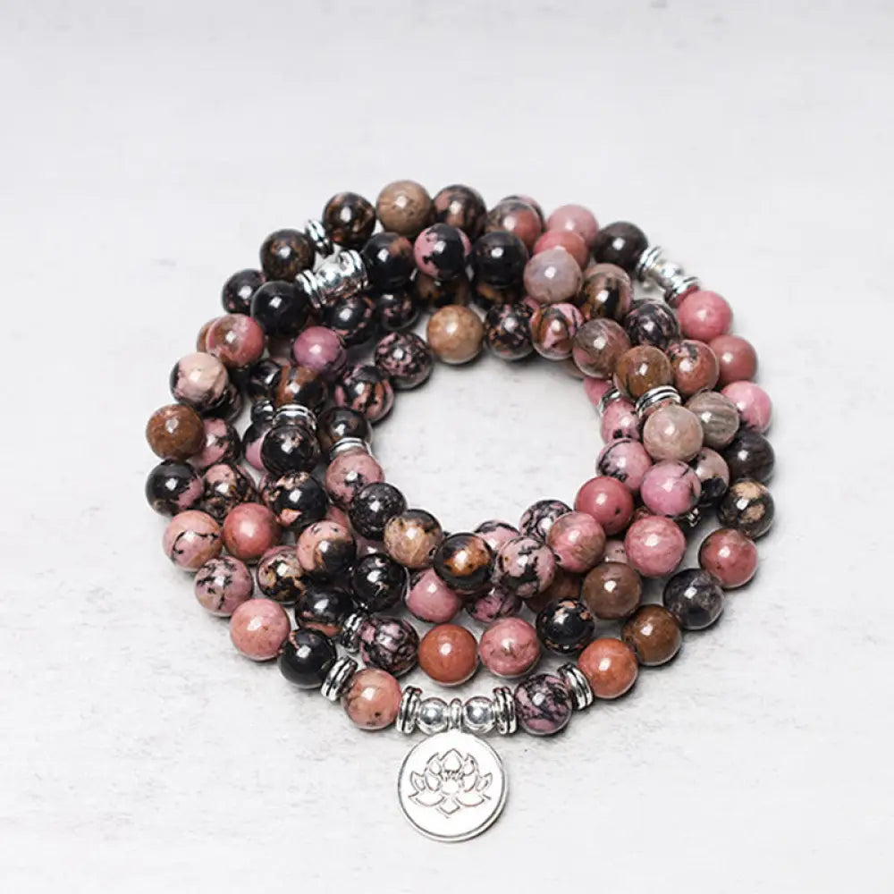 BWOOOH 108 Rhodonite Mala Beads with an intricate Lotus symbol charm, showcasing the deep pink hues of the 8mm compassion energy stones and premium elastic band for a 15-19cm wrist.