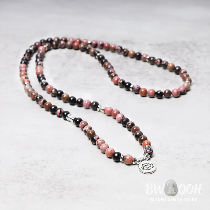 BWOOOH 108 Rhodonite Mala Beads with an intricate Lotus symbol charm, showcasing the deep pink hues of the 8mm compassion energy stones and premium elastic band for a 15-19cm wrist. - View 3