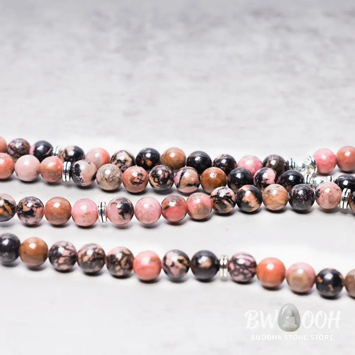 BWOOOH 108 Rhodonite Mala Beads with an intricate Lotus symbol charm, showcasing the deep pink hues of the 8mm compassion energy stones and premium elastic band for a 15-19cm wrist. - View 4