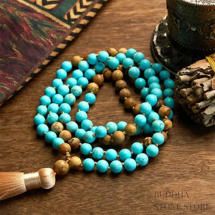 BWOOOH 108-bead mala bracelet featuring polished 8mm turquoise and picture jasper beads, a soft tassel, handcrafted for meditation, spiritual balance, and positive energy practices.