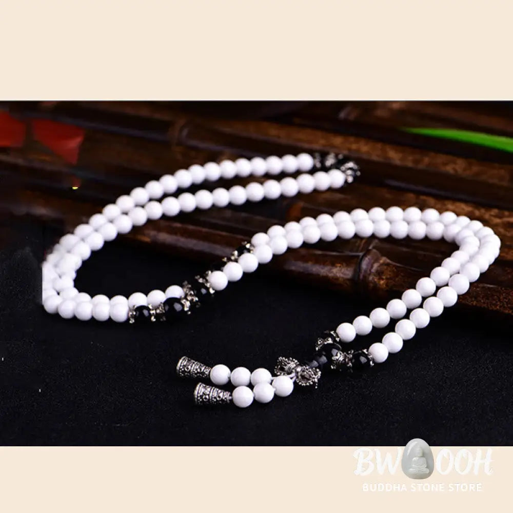 BWOOOH 108 White Porcelain Mala Beads Patience Bracelet. Features 'Om Mani Padme Hum' mantra, symbolizing purity and focus for meditation. - View 2