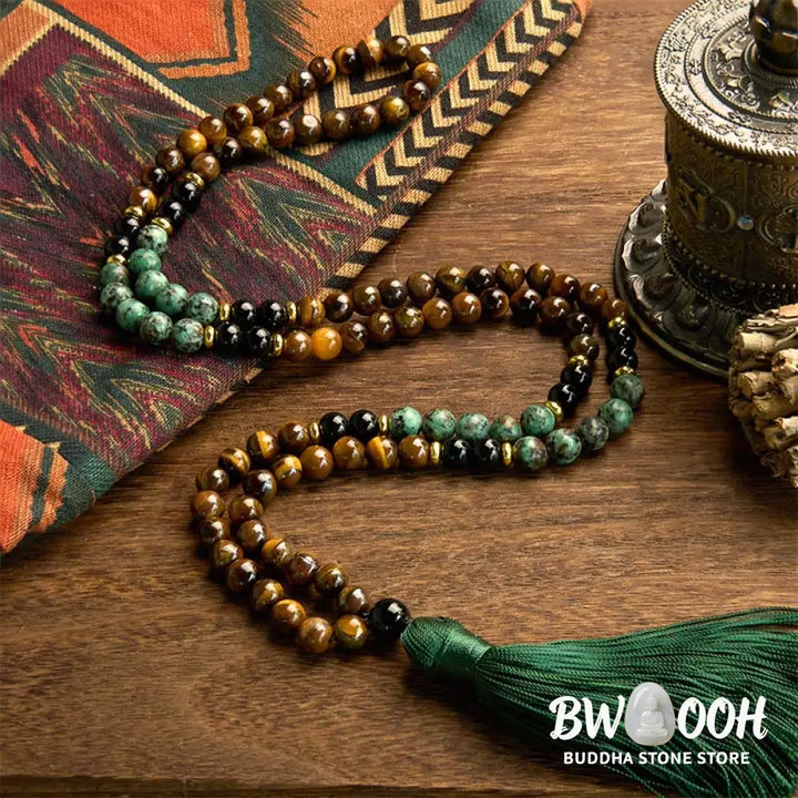 BWOOOH 108 Mala meditation bracelet featuring polished 8mm Tiger Eye and Turquoise beads, with a traditional tassel, symbolizing protection, courage, and balance for spiritual growth and mindful practice. - View 2