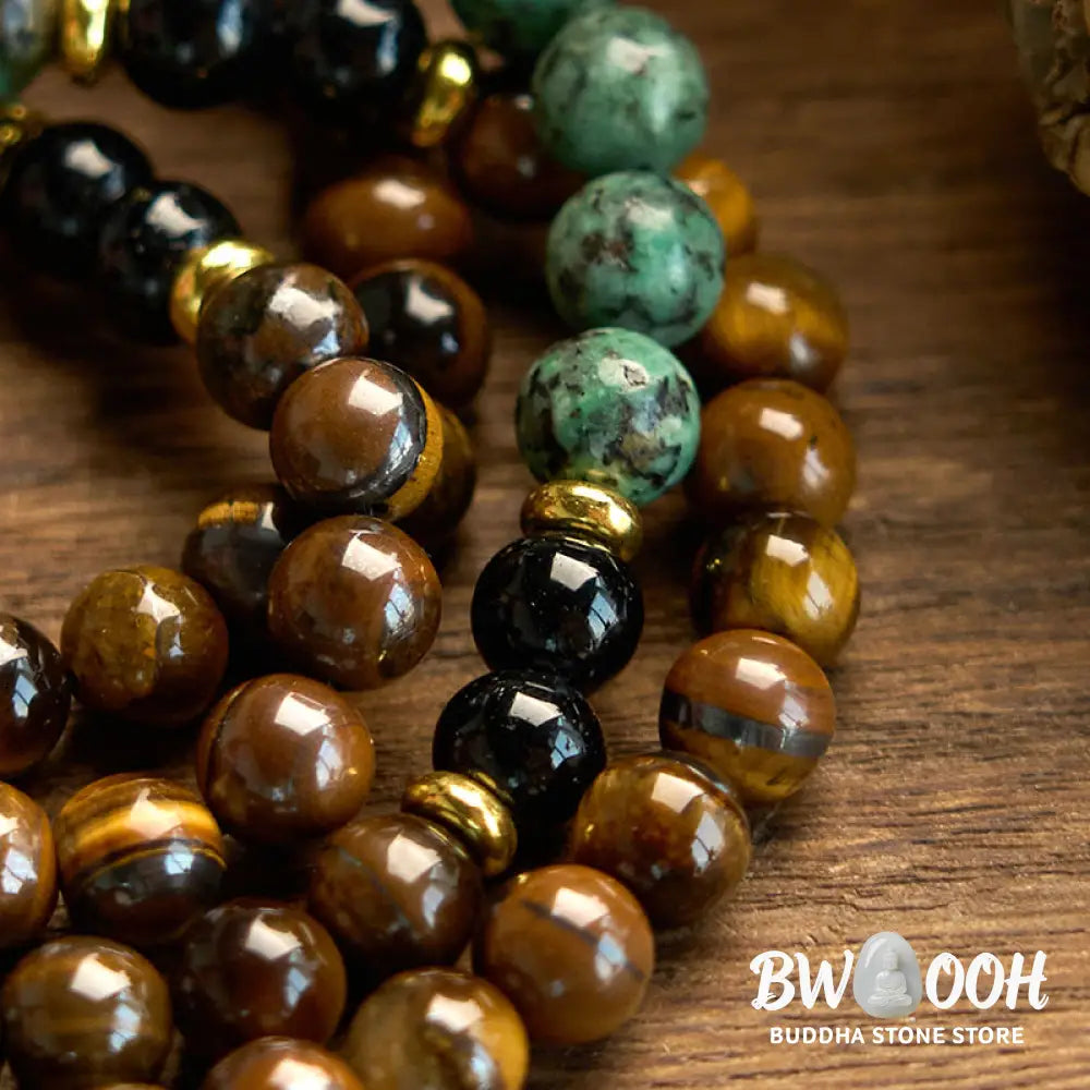 BWOOOH 108 Mala meditation bracelet featuring polished 8mm Tiger Eye and Turquoise beads, with a traditional tassel, symbolizing protection, courage, and balance for spiritual growth and mindful practice. - View 5